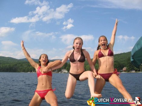 Teenagers jumping into the sea