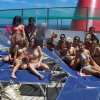 A large group of girls on boat