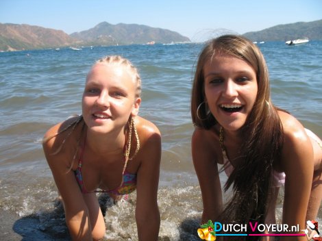 Teens on their knees in water