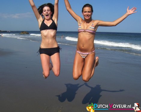 Girls jumping into the sea