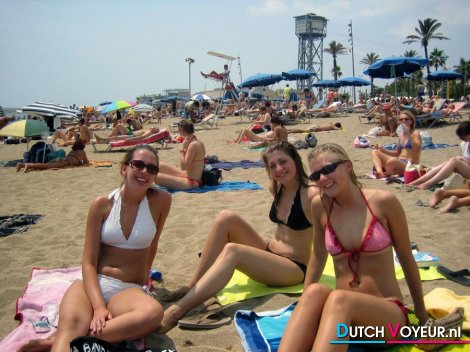 Girl group on the beach smiling for the camera